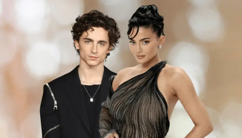 Kylie Jenner i Timothée Chalamet na wydarzeniu. Kylie w czarnej, transparentnej sukni, Timothée w eleganckim czarnym garniturze.