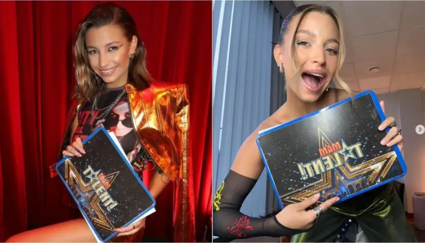 Julia Wieniawa z tabliczką "Mam Talent!" w złotym żakiecie i z błyszczącym makijażem.